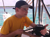 Boy working winch