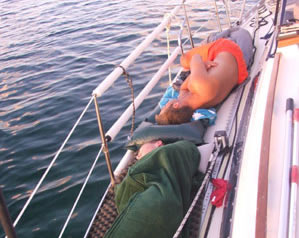 Boys sleeping on deck